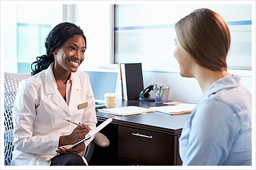 Staff Member Speaking with Patient